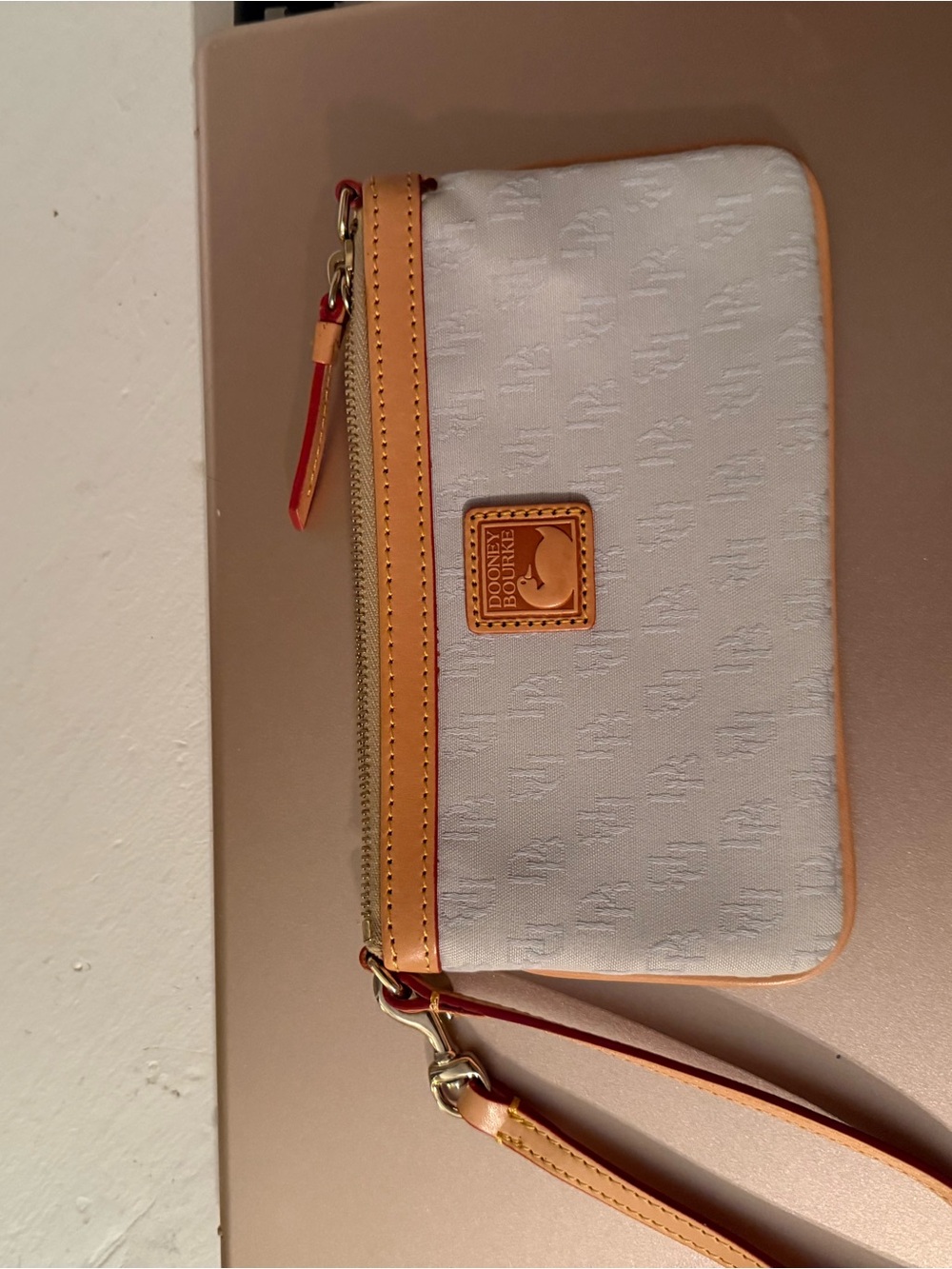 Dooney & Bourke White Wristlet with Tan Trim and Gold Hardware